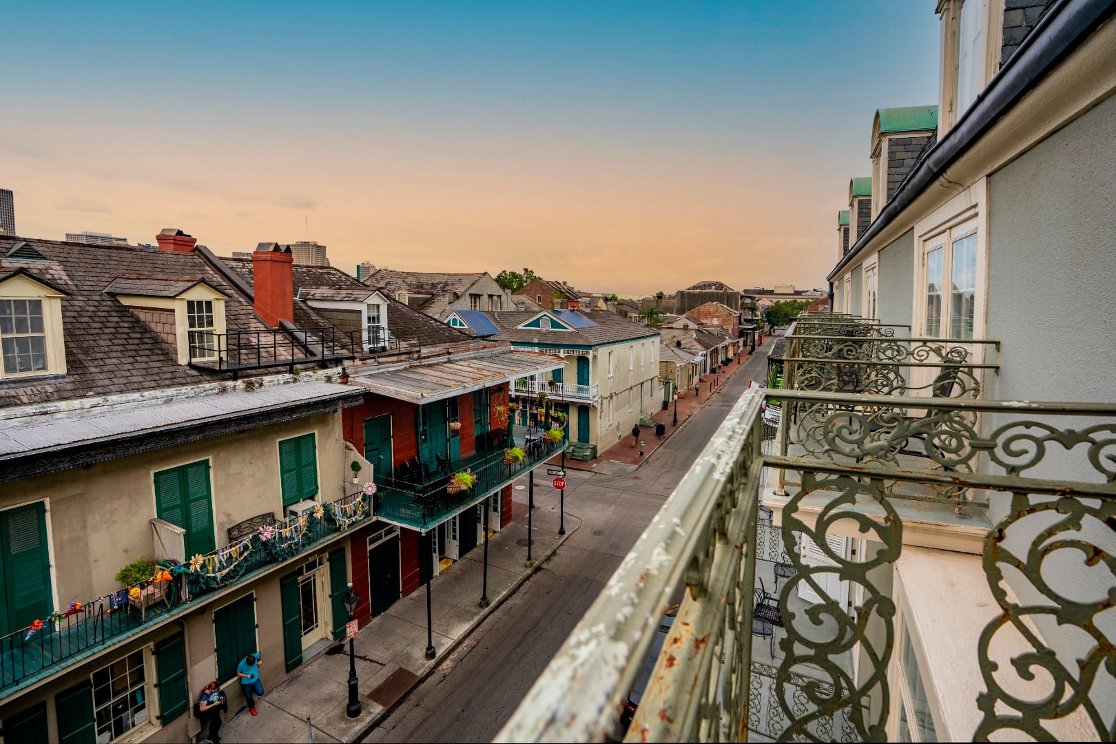 a view of a city street from a balcony